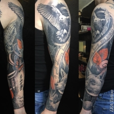 Sleeve with owl and fox and color accents  by LEA Tattoo