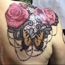 Roses and butterfly on lace in color  by LEA Tattoo