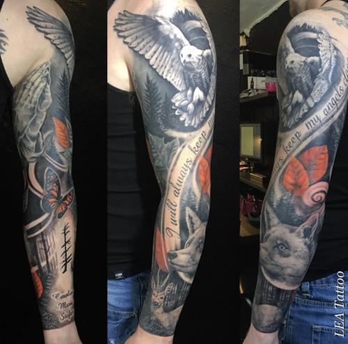 Sleeve with owl, fox and lettering etc  in black & gray and color accents on leaves.